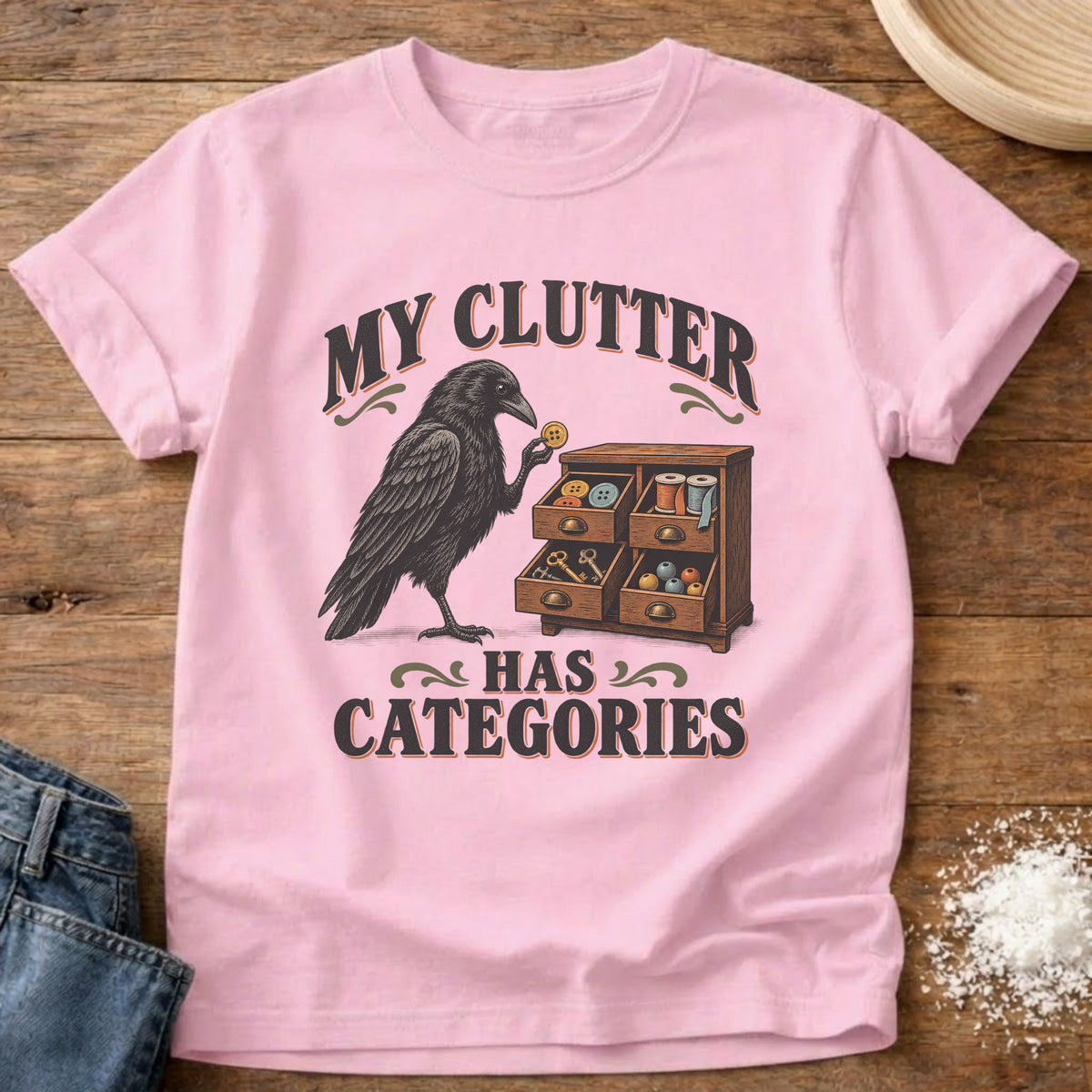 Knead More Fun Clutter Categories Crow graphic t-shirt in Blossom