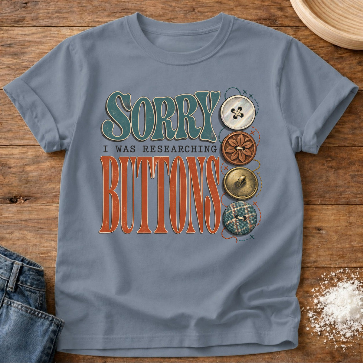Knead More Fun Buttons t-shirt in Blue Jean
