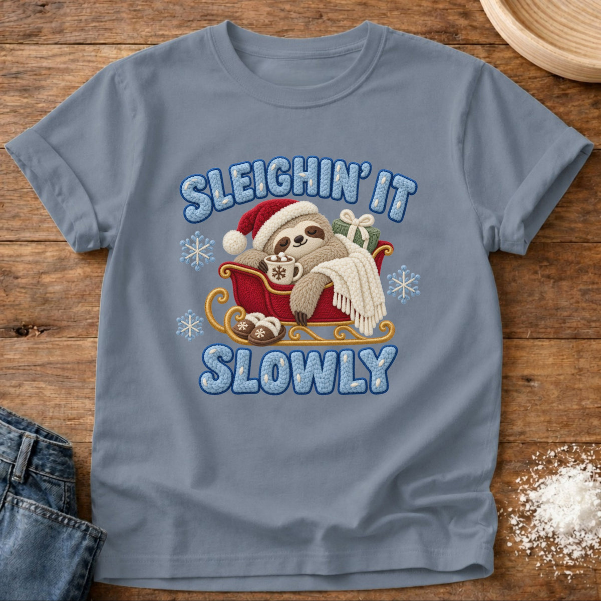 Knead More Fun Sleighin It Sloth graphic t-shirt in Blue Jean