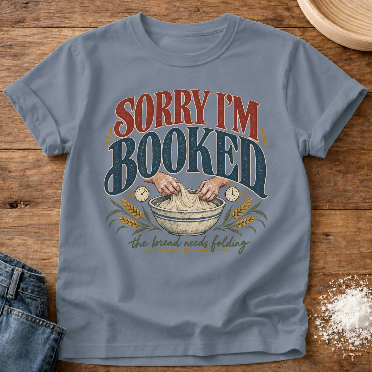 Knead More Fun Bread Needs Folding graphic t-shirt in Blue Jean