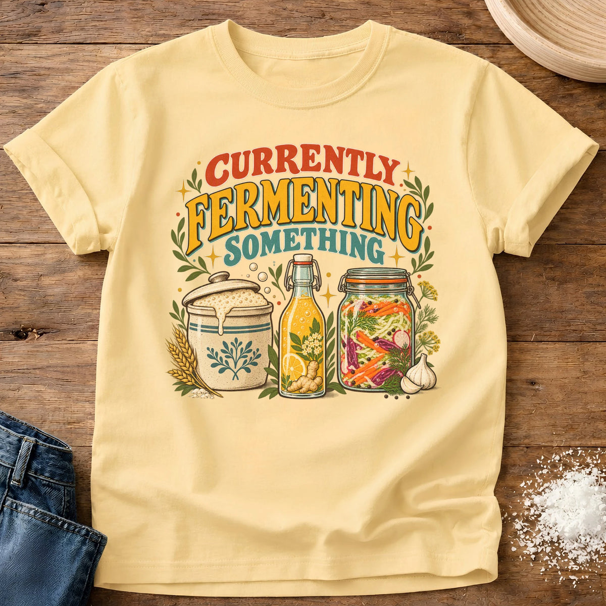 Knead More Fun Currently Fermenting graphic t-shirt in Butter