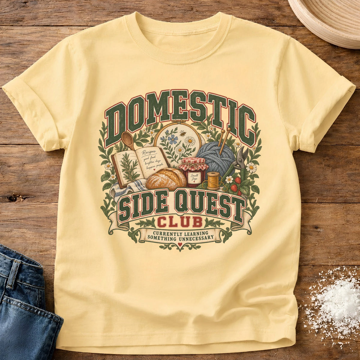 Knead More Fun Domestic Side Quest graphic t-shirt in Butter