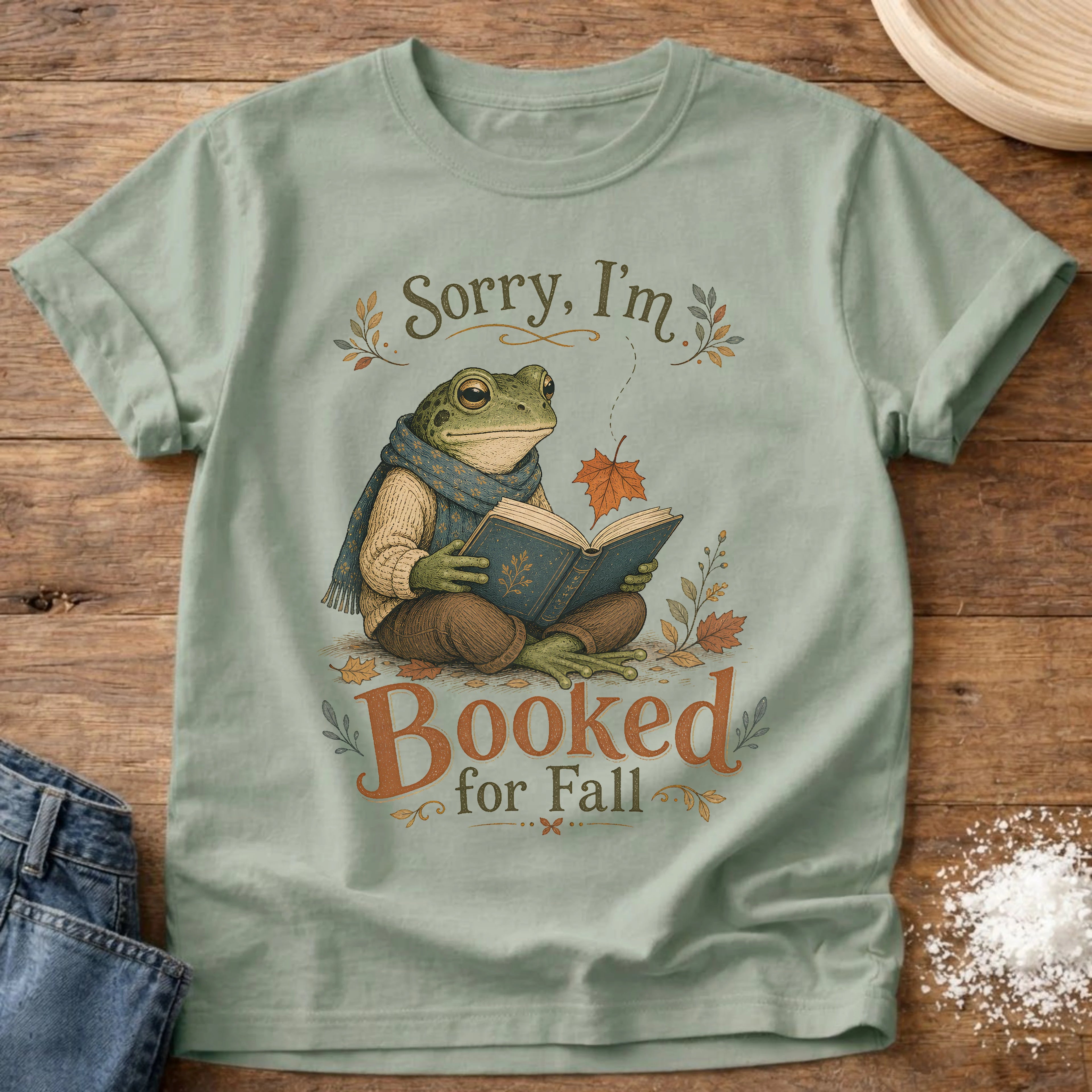 Knead More Fun Sorry I'm Booked reading frog t-shirt in Bay