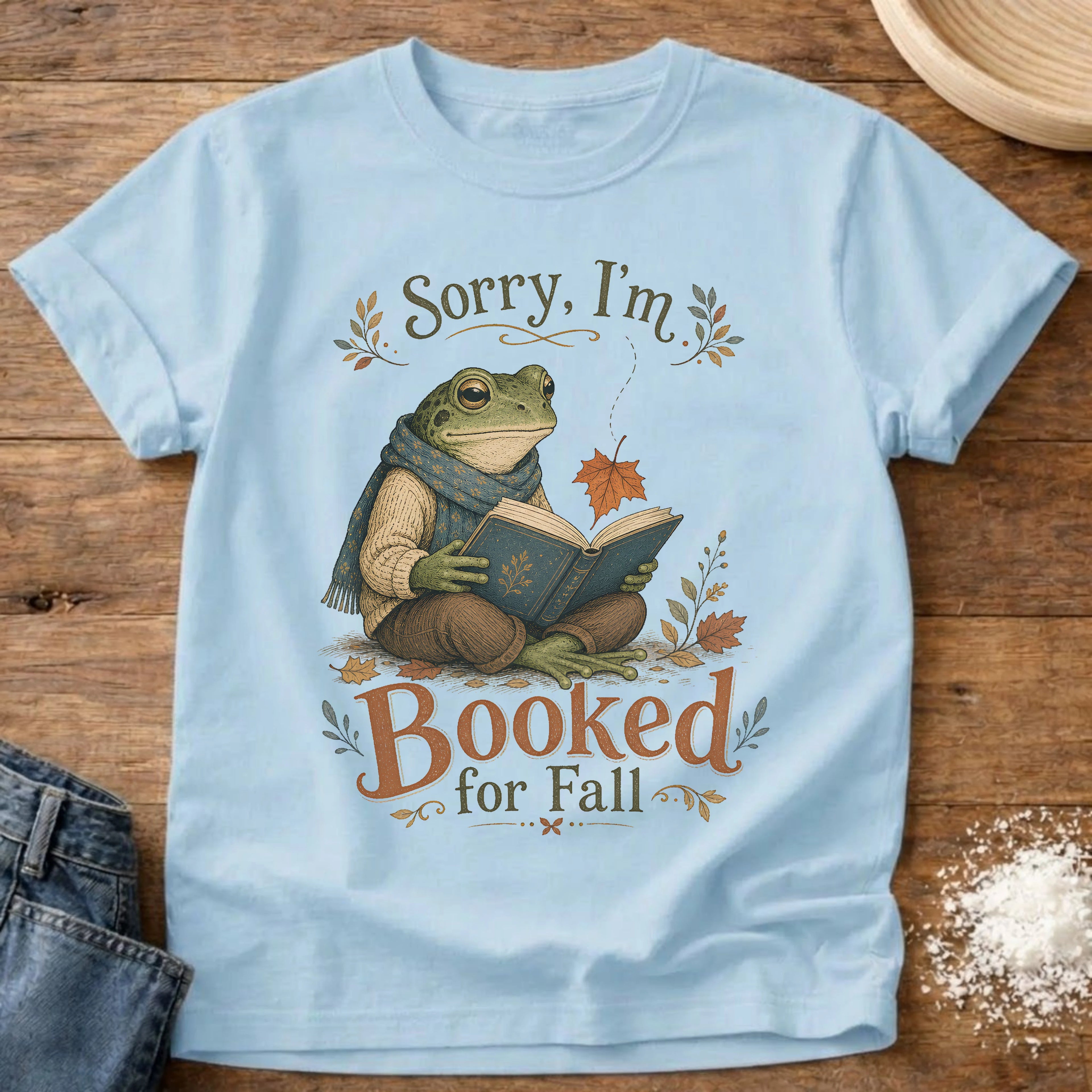 Knead More Fun Sorry I'm Booked reading frog t-shirt in Chambray