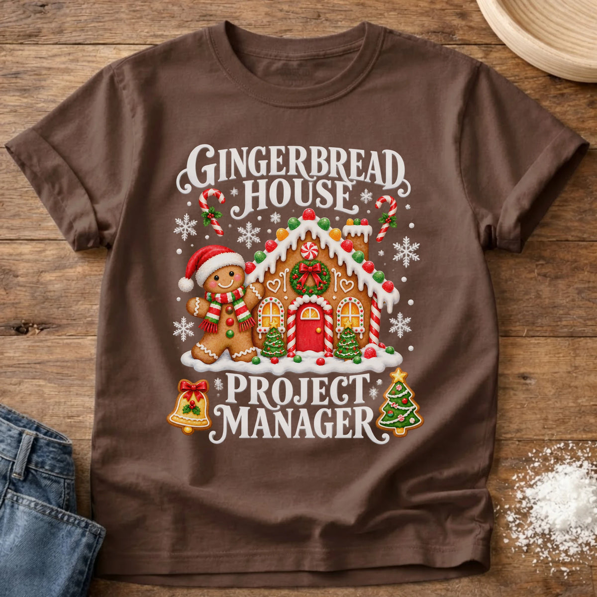 Knead More Fun Gingerbread Manager gingerbread house t-shirt in Espresso