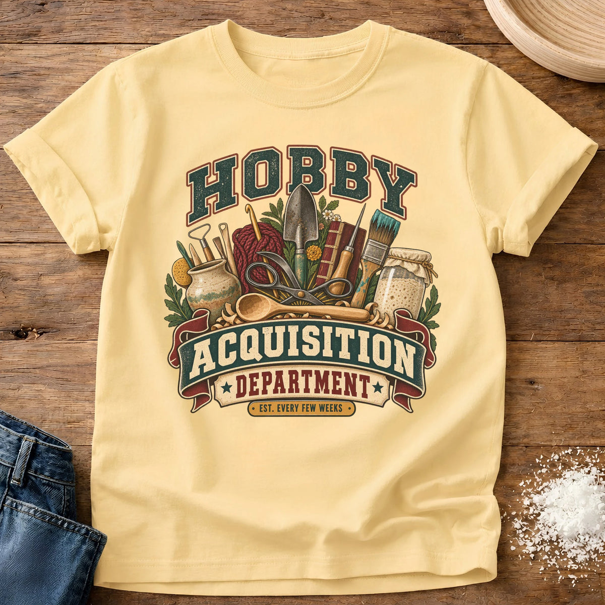 Knead More Fun Hobby Acquisition Dept graphic t-shirt in Butter