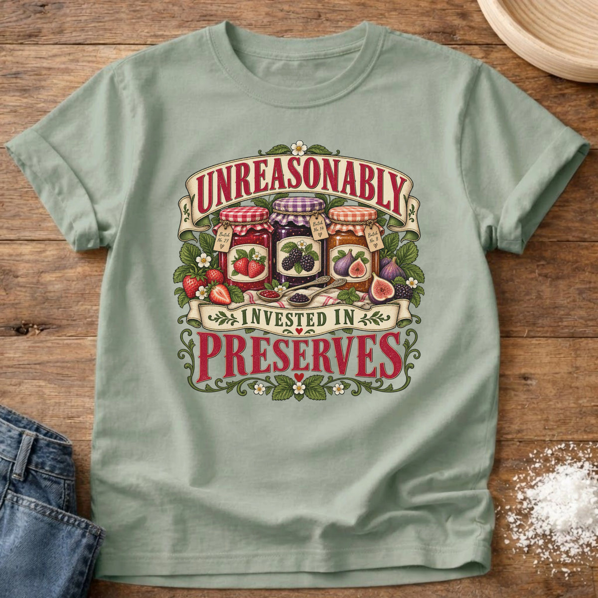 Knead More Fun Invested In Preserves graphic t-shirt in Bay