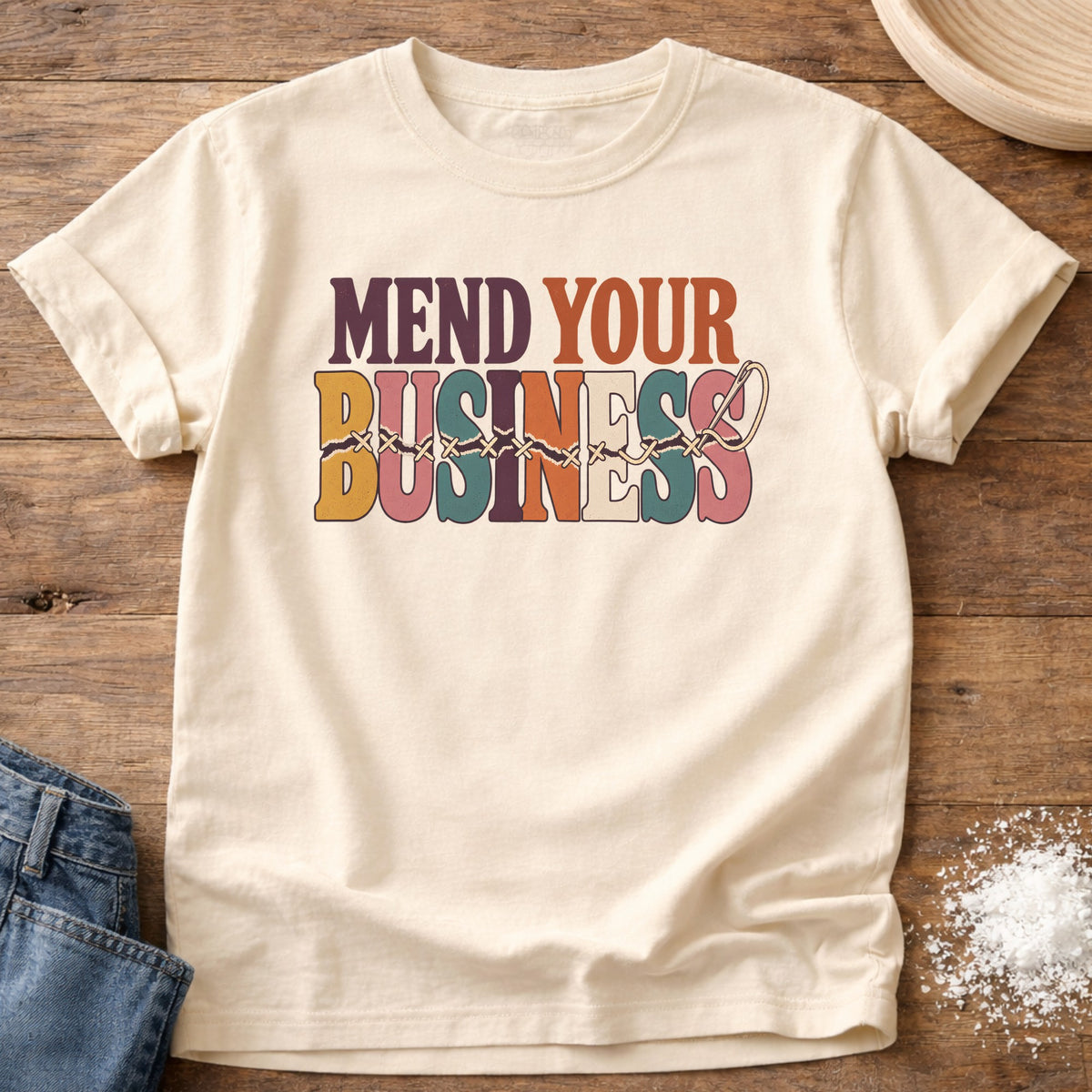 Knead More Fun Mend Your Business graphic t-shirt in Ivory