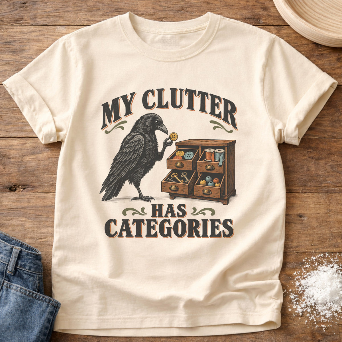 Knead More Fun Clutter Categories Crow graphic t-shirt in Ivory