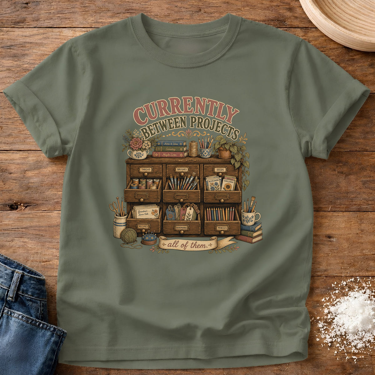 Knead More Fun Between Projects graphic t-shirt in Moss