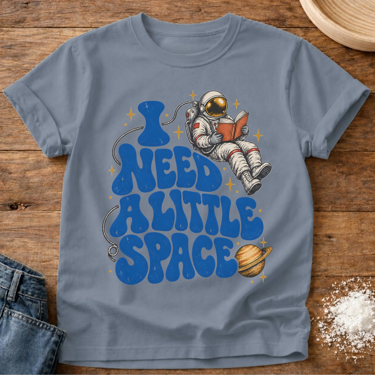 Knead More Fun Need Little Space astronaut reading t-shirt in Blue Jean