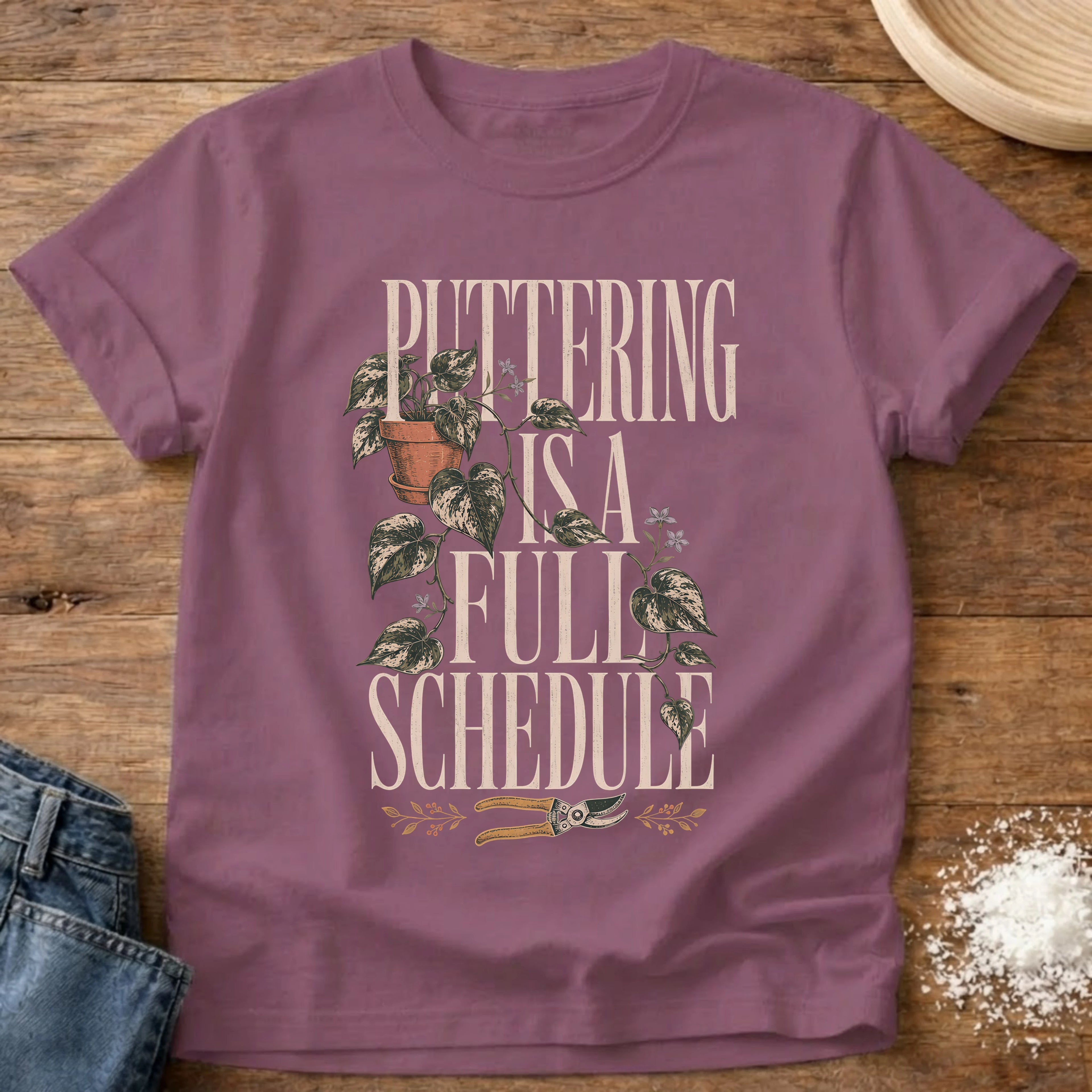 Knead More Fun puttering schedule garden t-shirt in Berry
