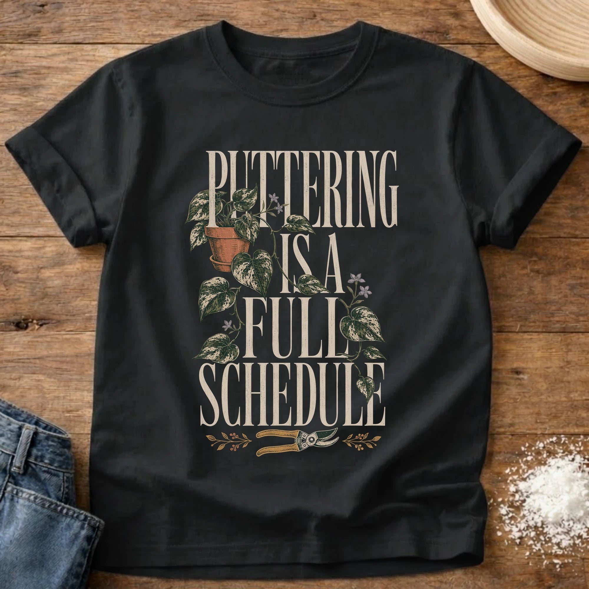 Knead More Fun puttering schedule garden t-shirt in Black