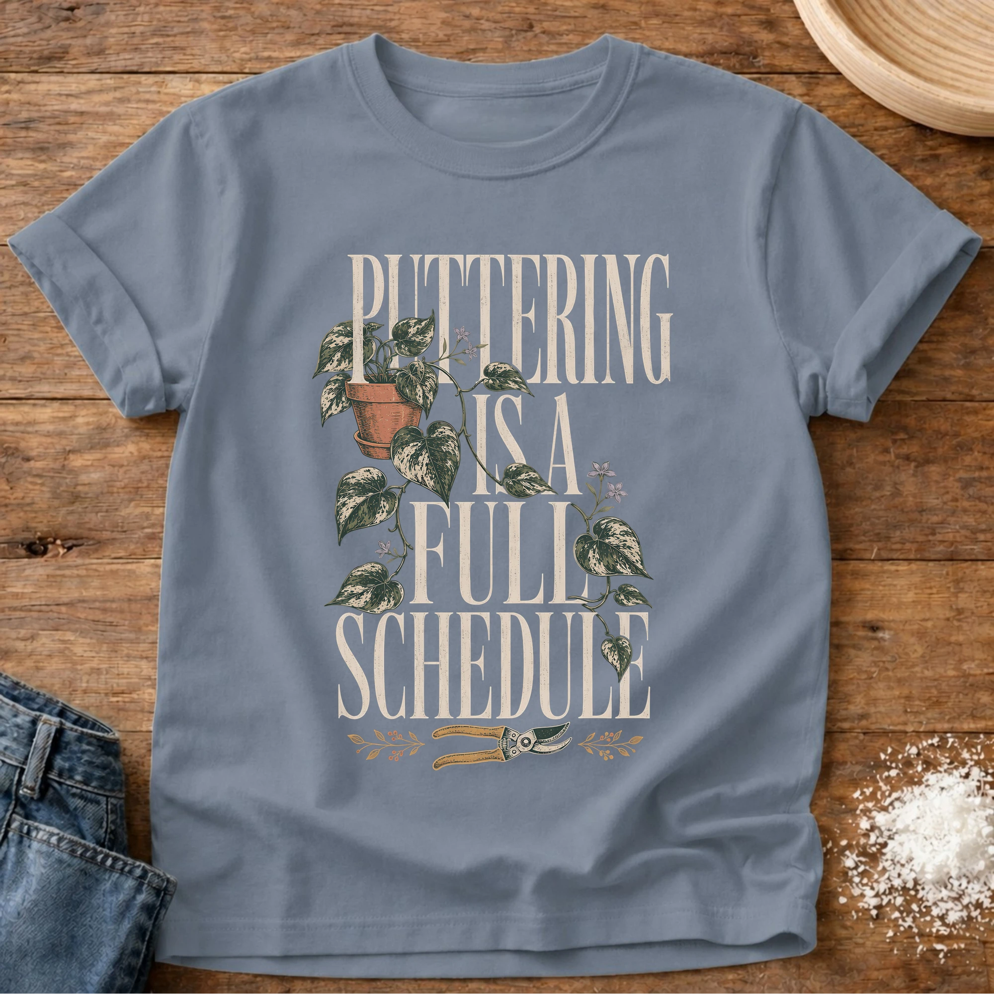 Knead More Fun puttering schedule garden t-shirt in Blue Jean